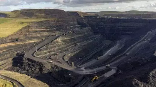 This is an image of a pit where the strip mining is well under the way.